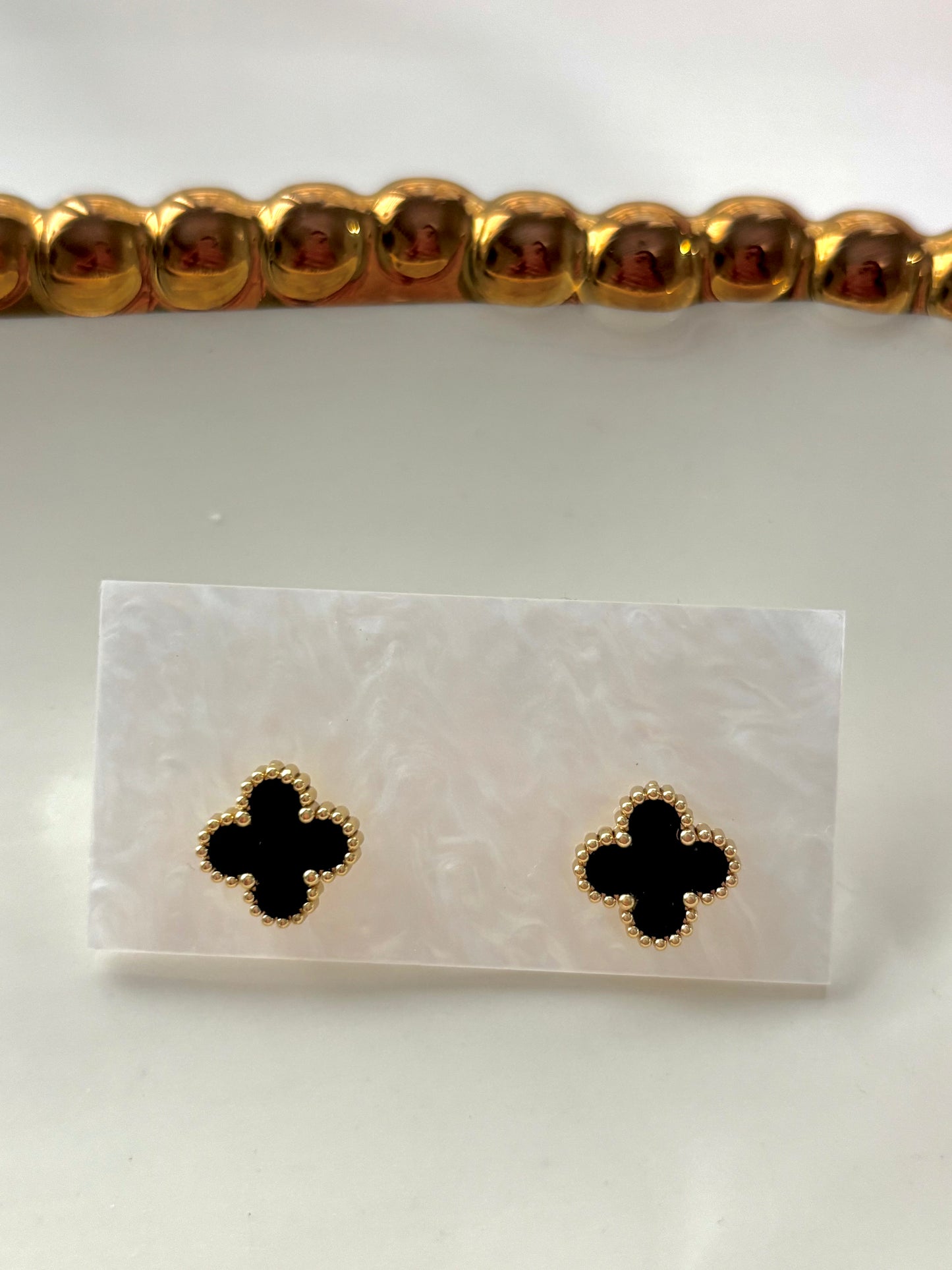 “Black clover earings”